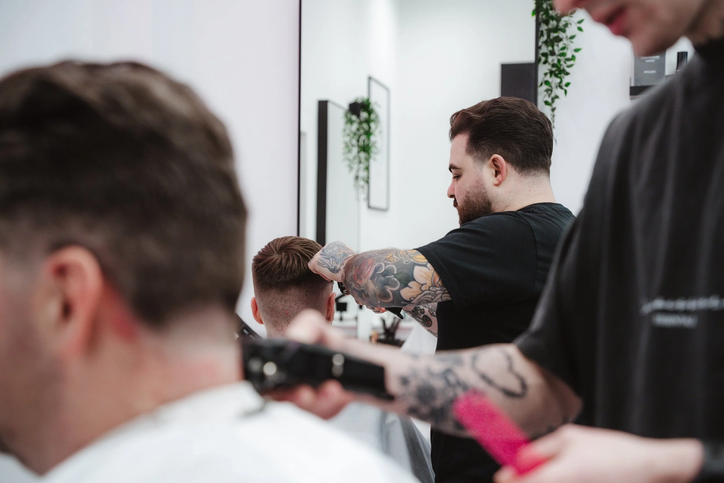 Client enjoying a fresh haircut at ClipLab