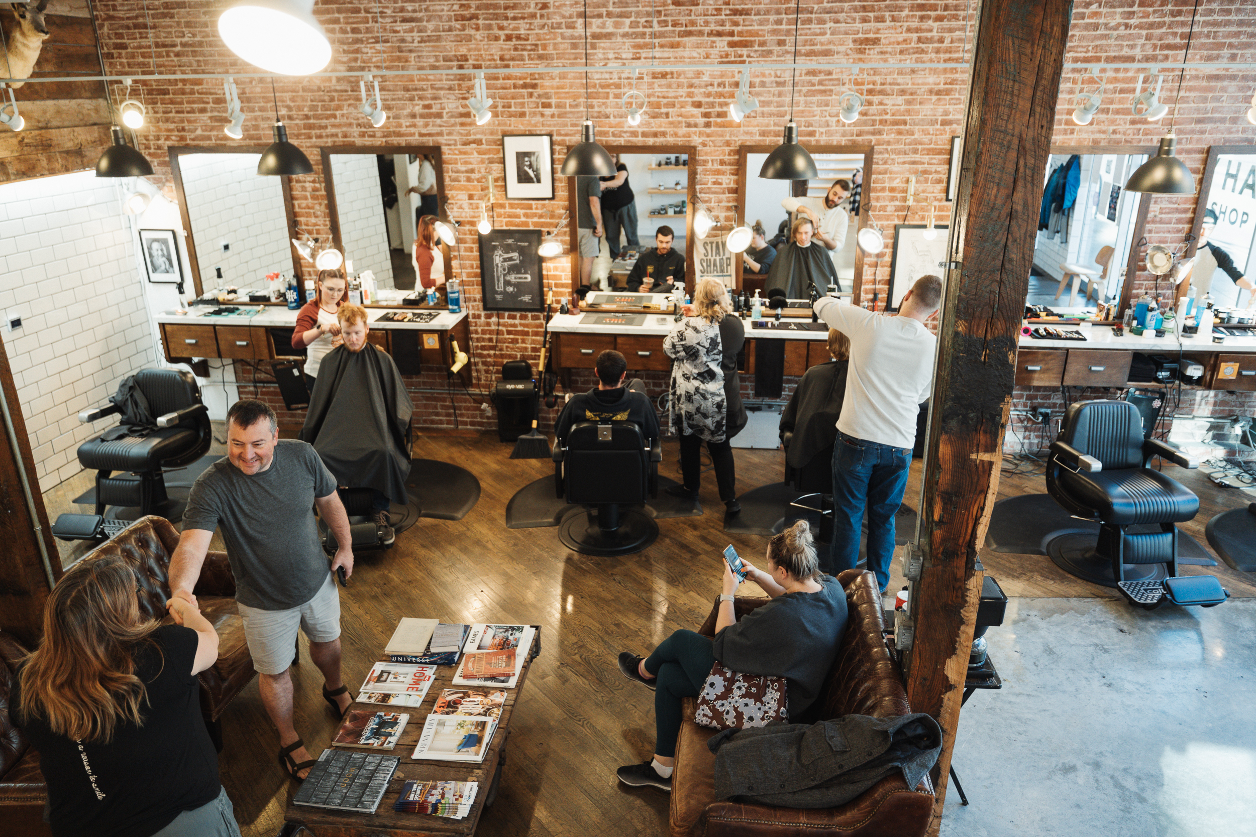 A client enjoying a fresh haircut at ClipLab