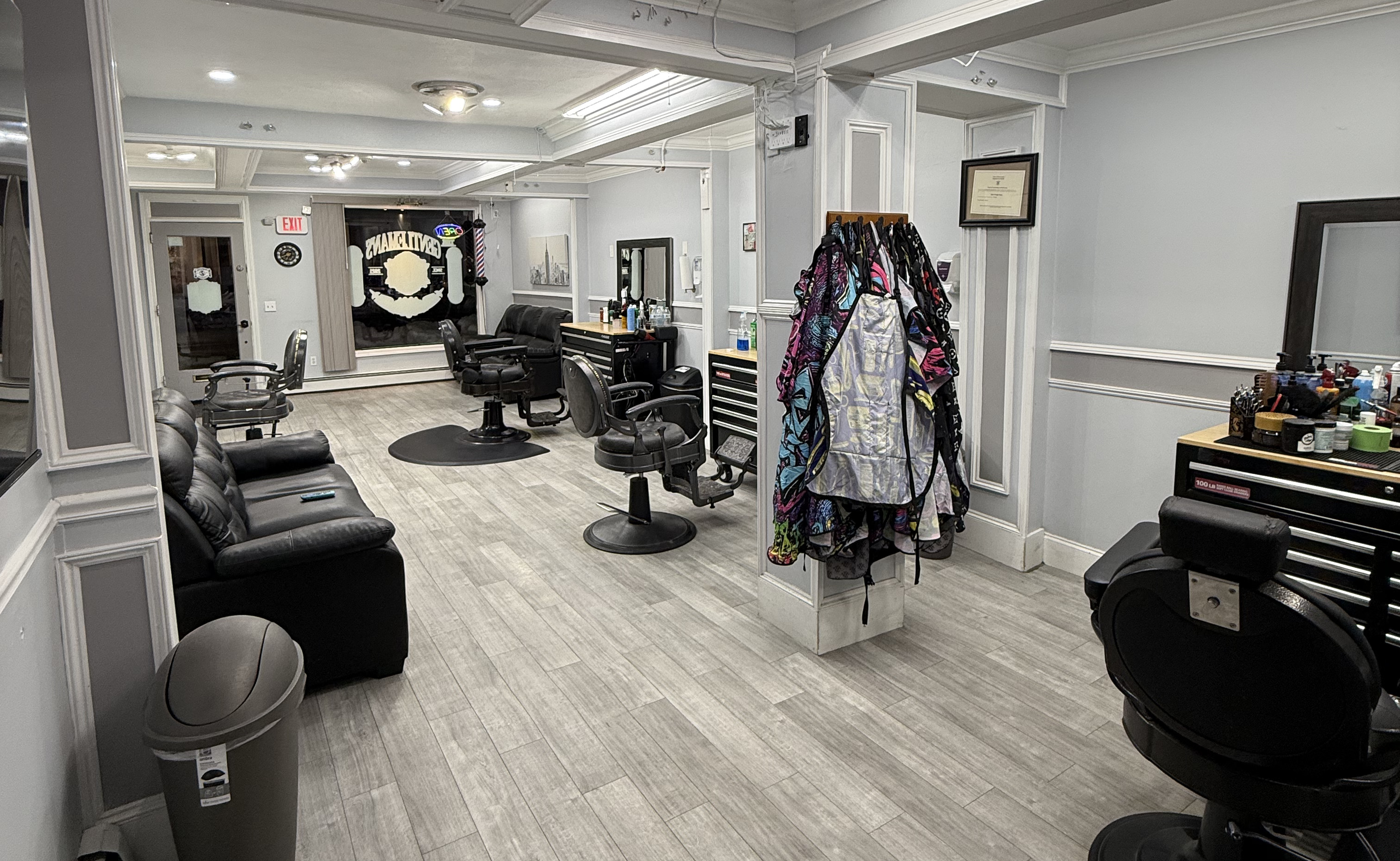 Professional barber providing a detailed haircut